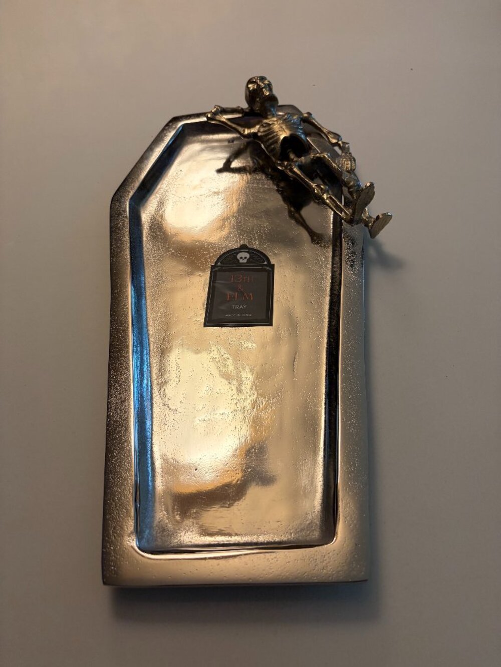 13TH & ELM HALLOWEEN SILVER METAL COFFIN-SHAPED SKELETON SERVING TRAY 18"
